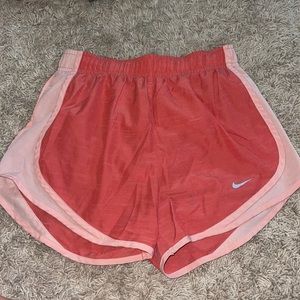heathered red/pink nike shorts